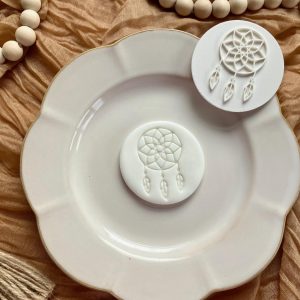 7cm fondant stamp of a dream catcher with feathers and circular web